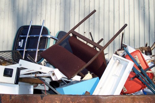 Workers carrying boxed files during a Cranford office clearance operation