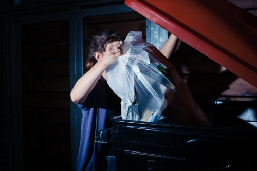 Recycling bins and sorted waste materials